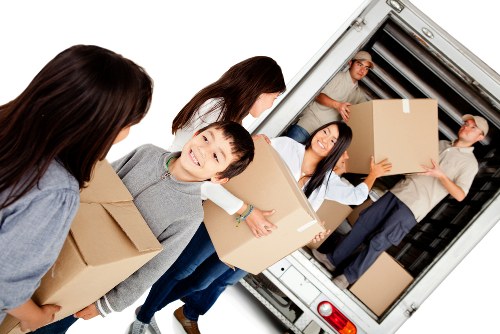 House removal team loading furniture for a Twickenham home move