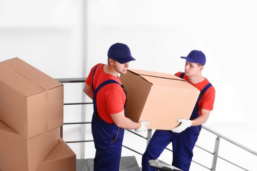 Moving van and removal boxes in a Twickenham residential street