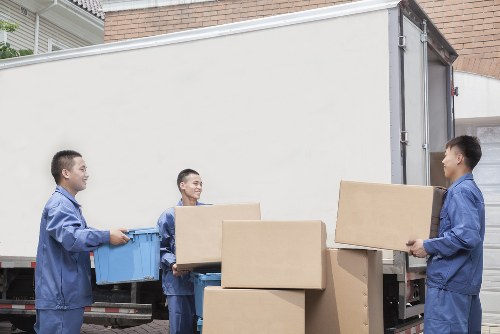 Office removals planning in Twickenham with packed boxes and move checklist