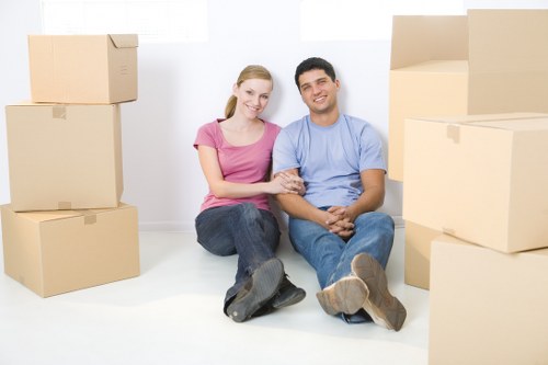 Local removal services in Twickenham loading furniture into a moving van