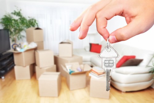 Packed moving boxes and furniture for a house removal