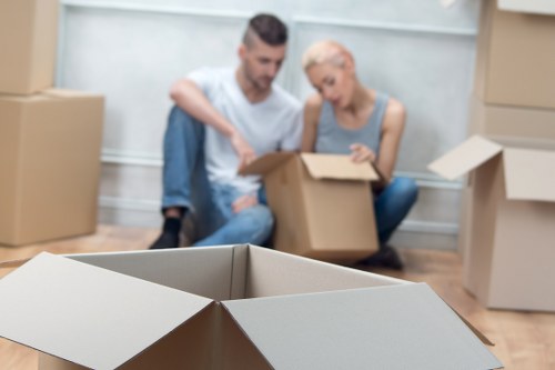 Twickenham removals team packing and organizing boxes for a local move