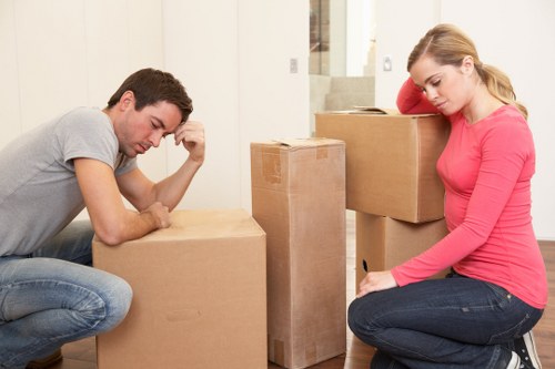 A hired removal truck loading household furniture in Twickenham