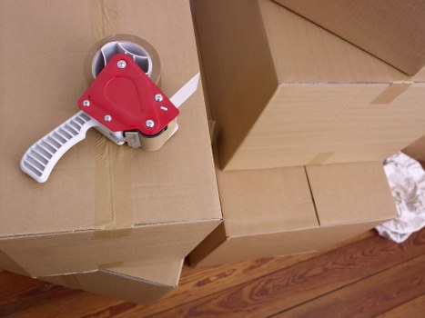 Careful packing for fragile belongings during a student removal
