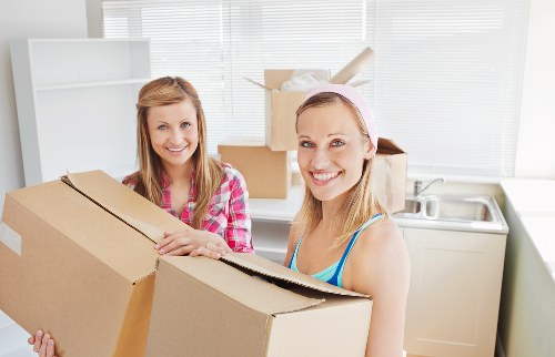 Professional office relocation team handling desks and equipment in Twickenham